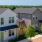 Beautiful landscaping among homes