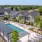 Resort-style swimming pool with lounge seating